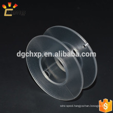 clear small plastic spool for heating wire or rope
